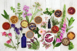 Different spices, bowls & leaves on a white background. Want to learn more about nutrition therapy in Raleigh, NC? Reach out to our dietitians today to learn more. 